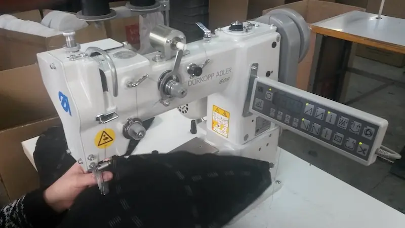 Shoulder pad sewing machine