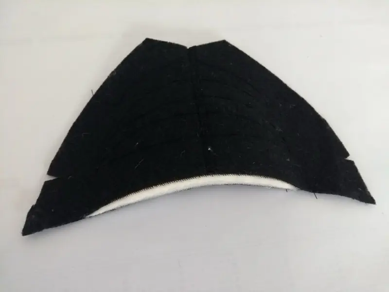 Black felt shoulder pad, close-up