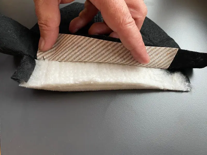 Layered structure of a shoulder pad